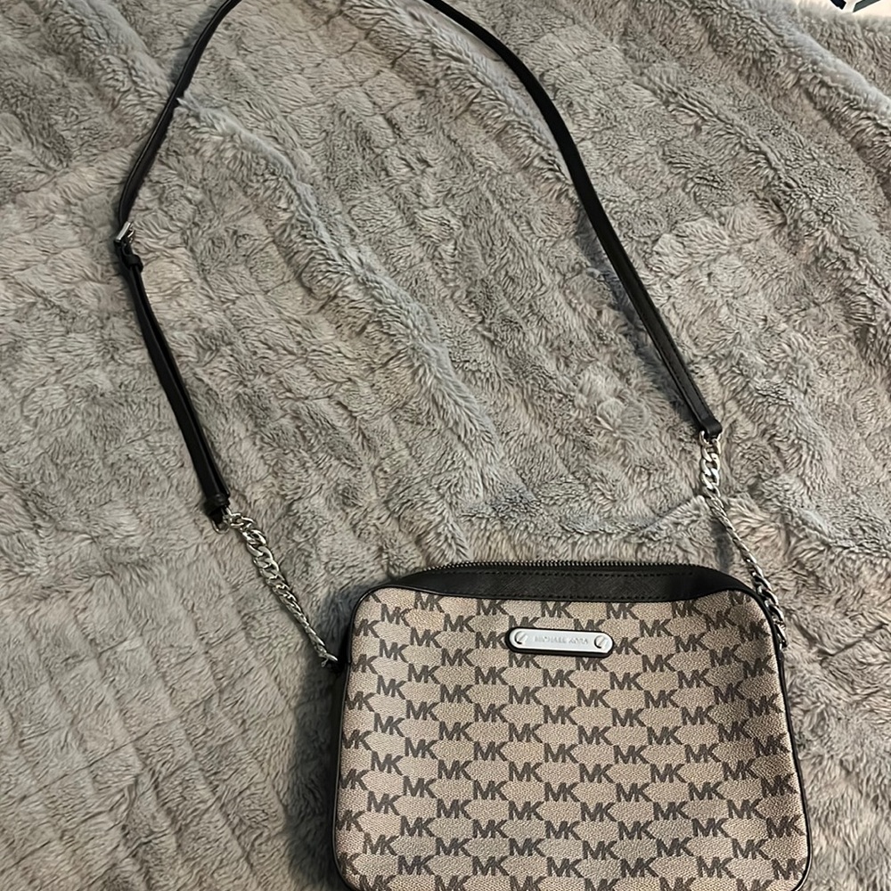 Adorable grey and black crossbody bag. Mk on the bag